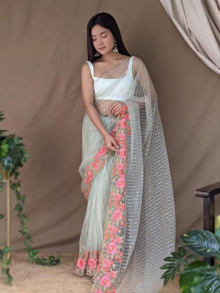 Celebrity Style Net Sequencing lining Saree with multi work flower